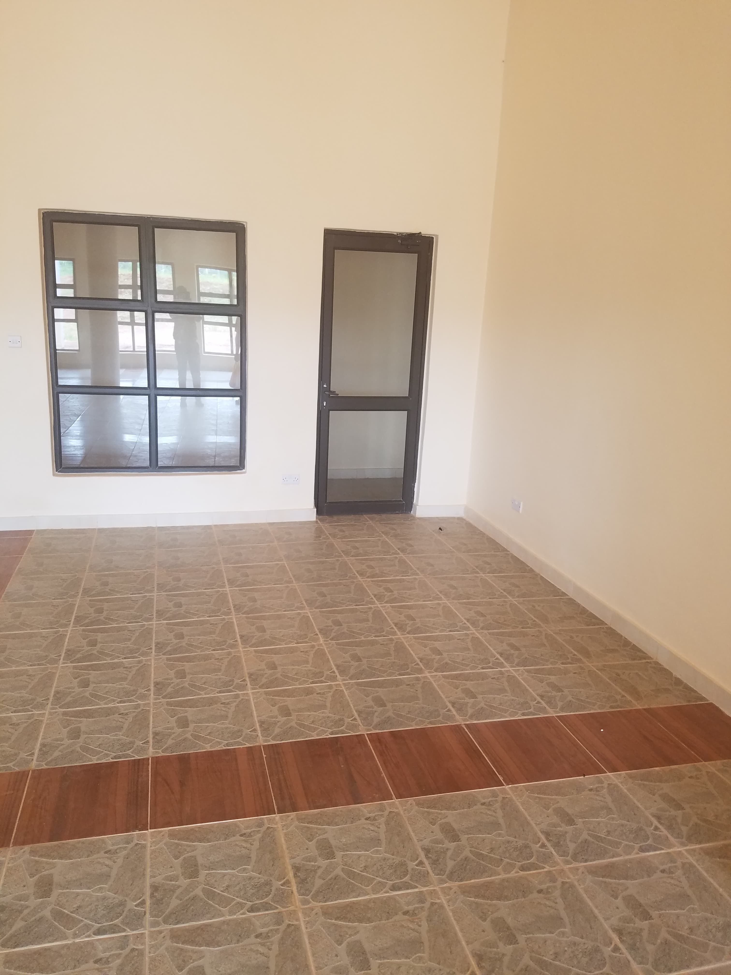 Combined aluminium door and window system installation